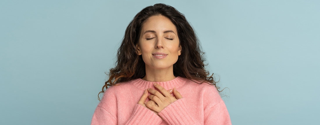 pink-sweater-woman-iStock-1295871383-stretch@1100w