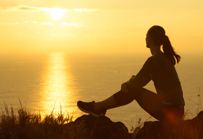 woman-reflecting-sunrise-iStock-514831248-flip